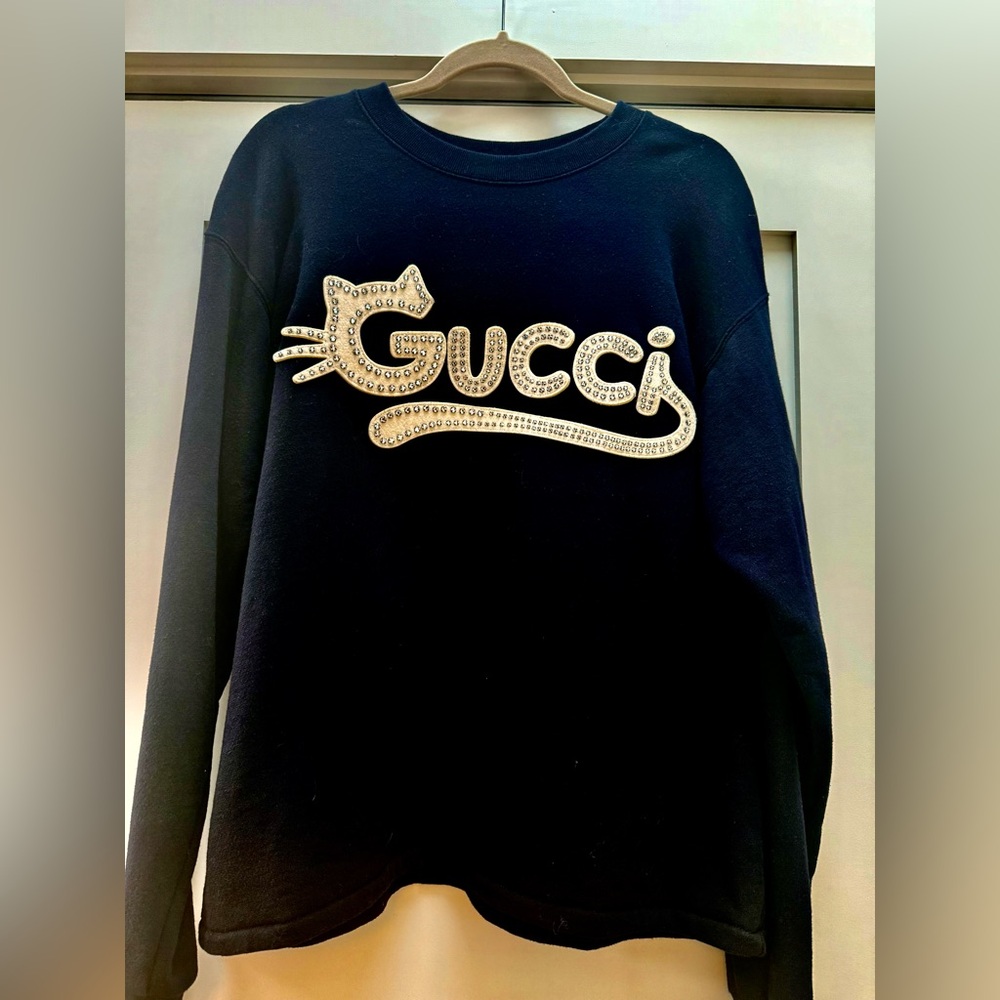 Gucci Black and Gold Label Detail